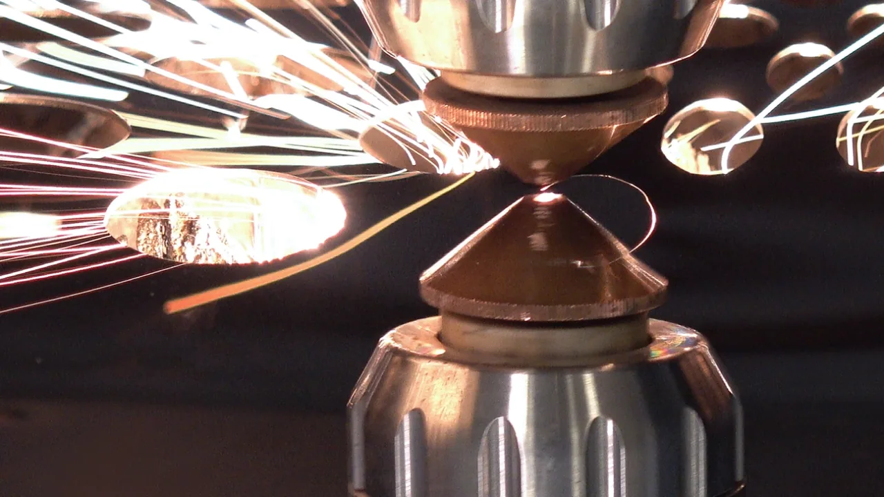CNC machine laser calibration technician using laser calibration tool in Pennsylvania.